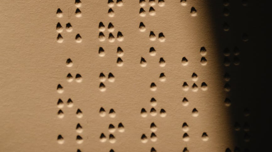 close up photo of braille