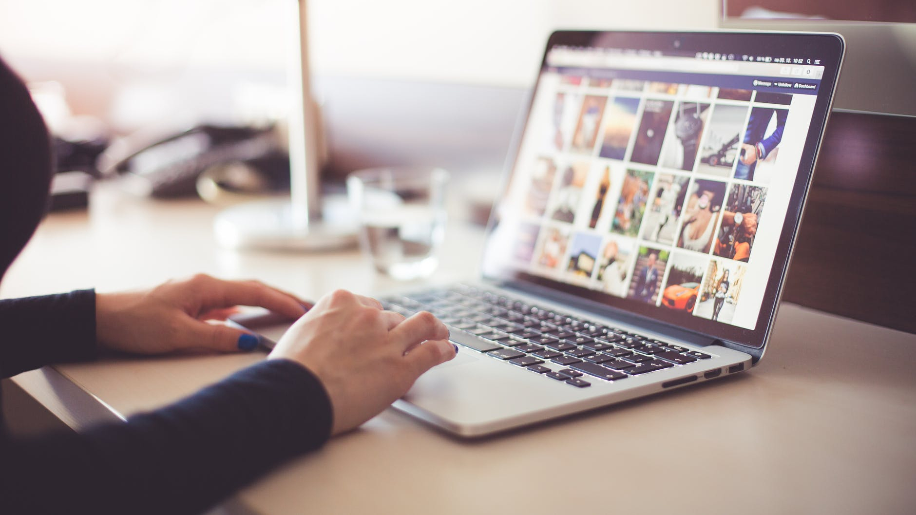person using laptop computer during daytime